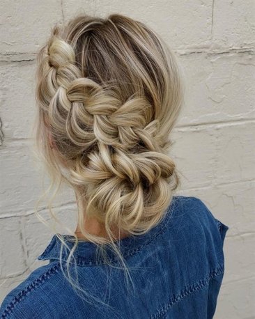 a-low-bun-with-a-side-dimensional-braid-that-forms-a-bun-is-a-cute-boho-idea.jpg