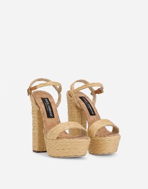 woven rafia platform sandals.jpeg