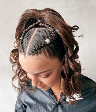 تسريحة Cornrows and Curly Ponytail.jpg