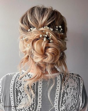 تسريحة Textured Updo with Floral Accents.jpg