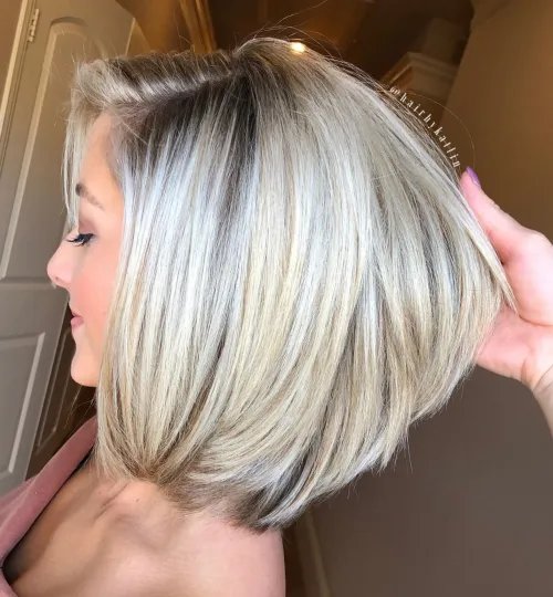 تسريحة Perfect Layered Blonde Bob with Bangs.jpg