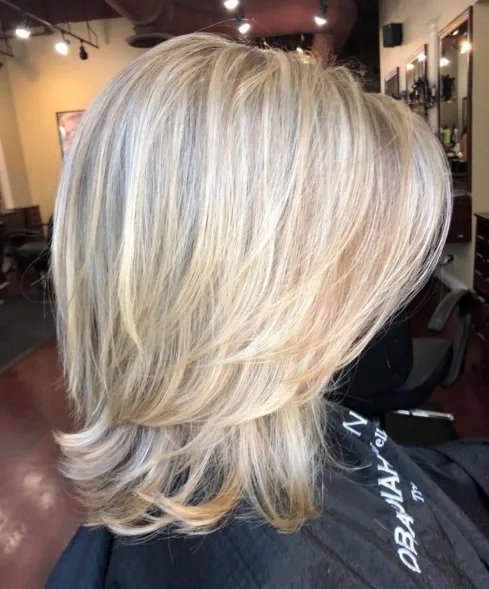 تسريحة Two-Layer Feathered Blonde Cut.jpg