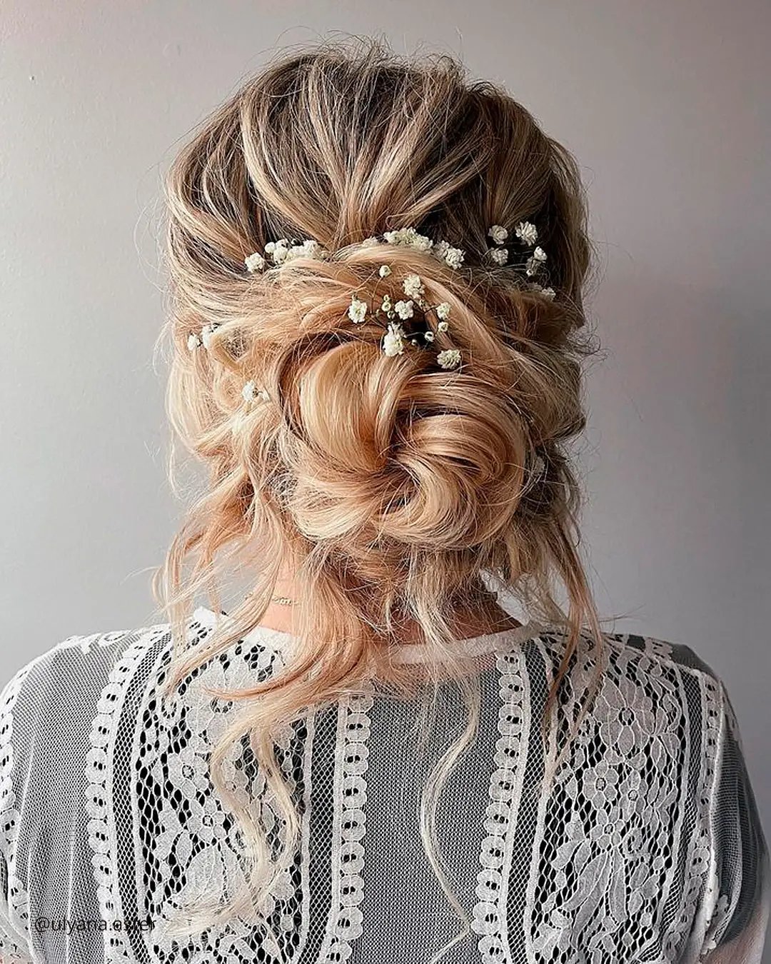 تسريحة Textured Updo with Floral Accents.jpg