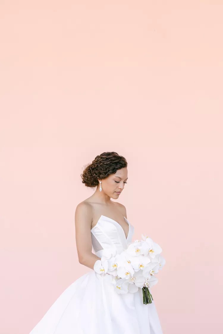 تسريحة A Low Bun With a Side Part.jpg