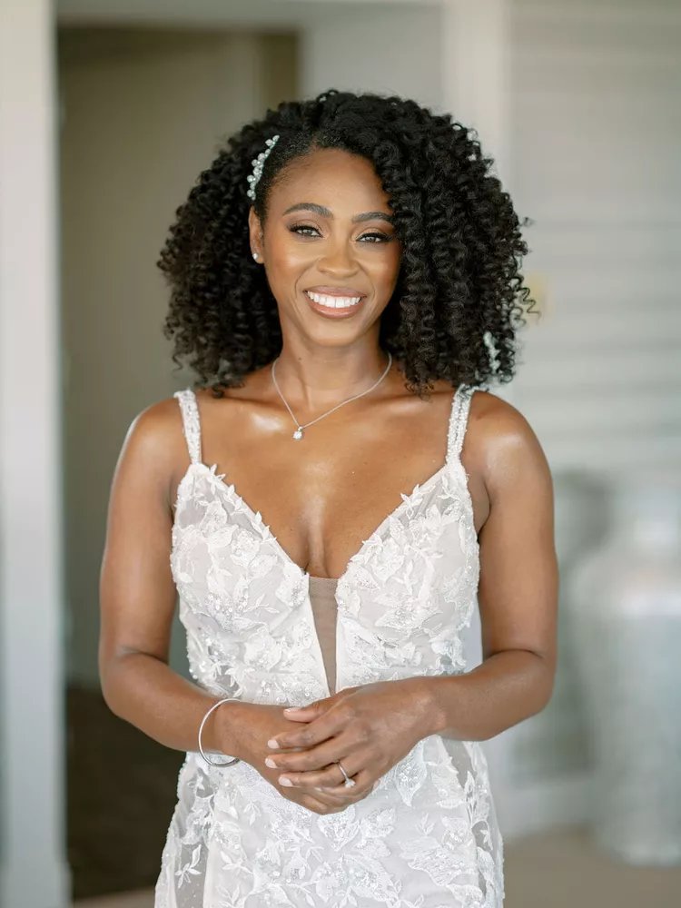 تسريحة Voluminous Curls With a Side Part.jpg