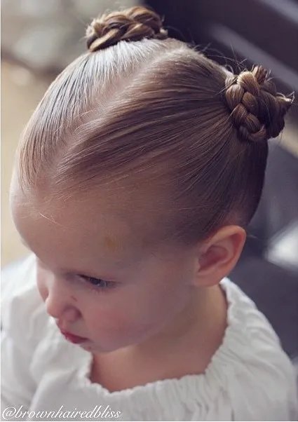 تسريحة Sleek and Formal Double Buns.jpg