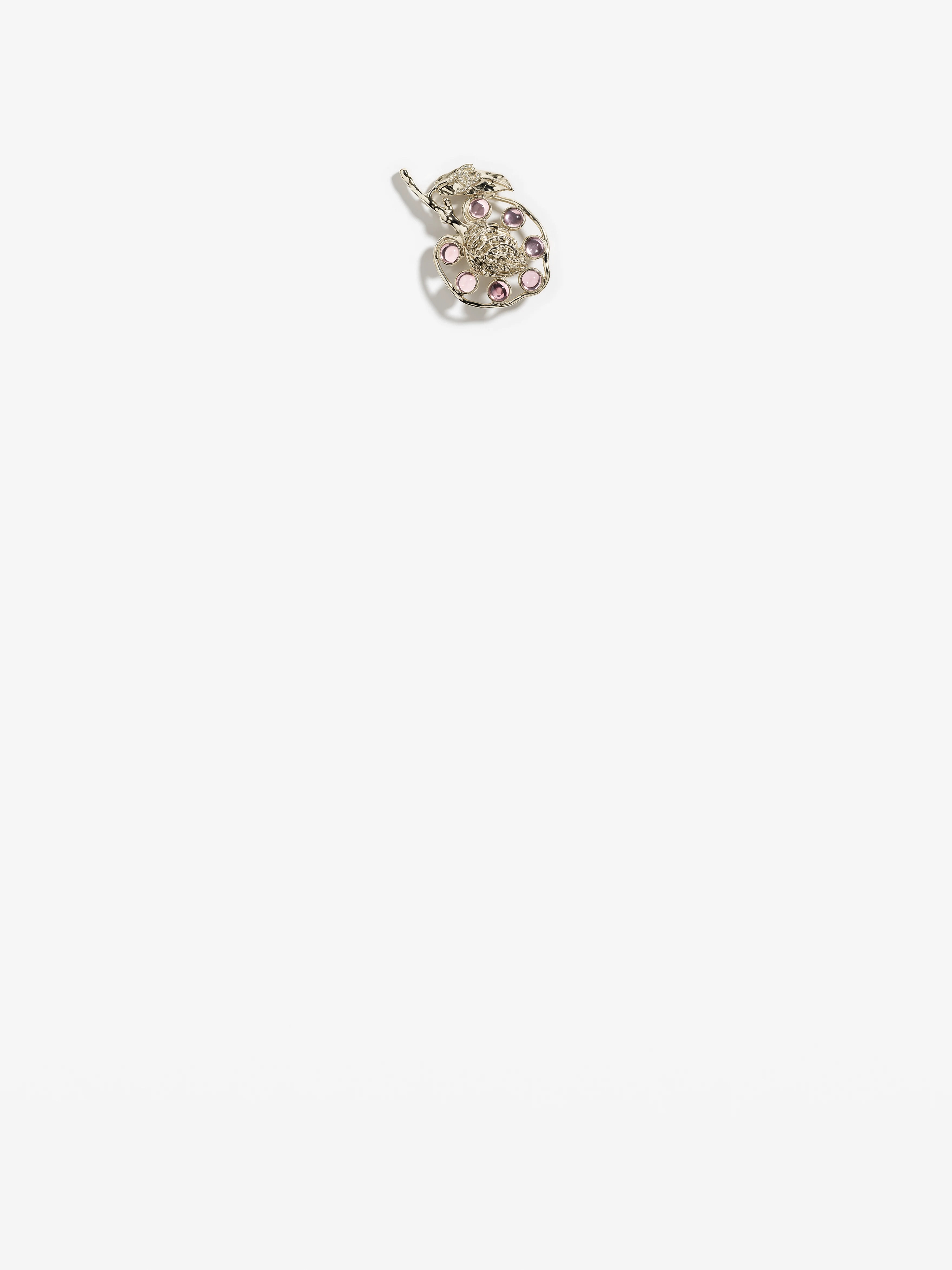 chanel brooch in metal glass and strass.jpeg